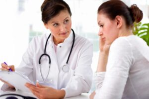 Doctor explaining to her female patient