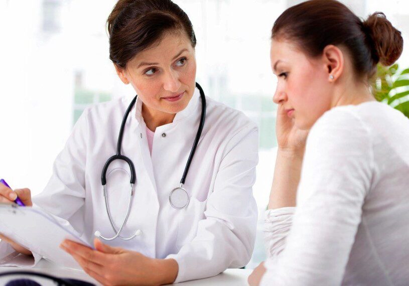 Doctor explaining to her female patient